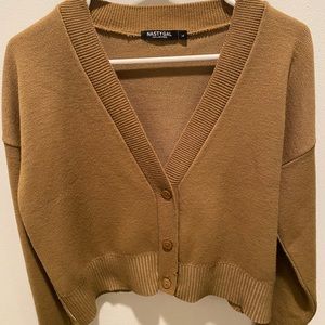 Beige/Brown cropped cardigan.